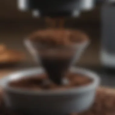 Close-up of coffee grounds being placed in a drip maker