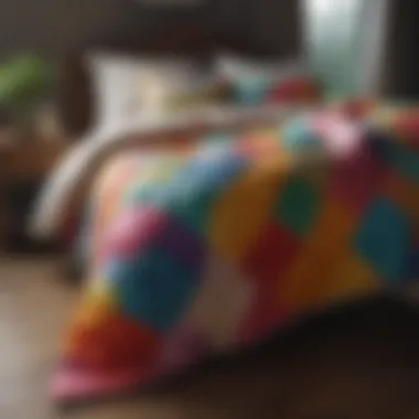 Colorful quilted comforter draped over a chair