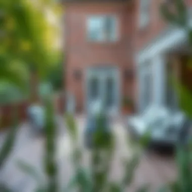 A beautifully designed outdoor space with a brick house and deck