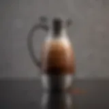 Stainless steel coffee carafe with coffee stains