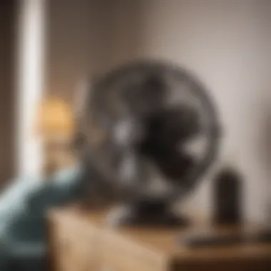 A fan positioned on a bedside table, subtly blending with elegant bedroom decor