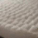 Close-up view of Tempur-Pedic Supreme Mattress Topper material showcasing its unique texture