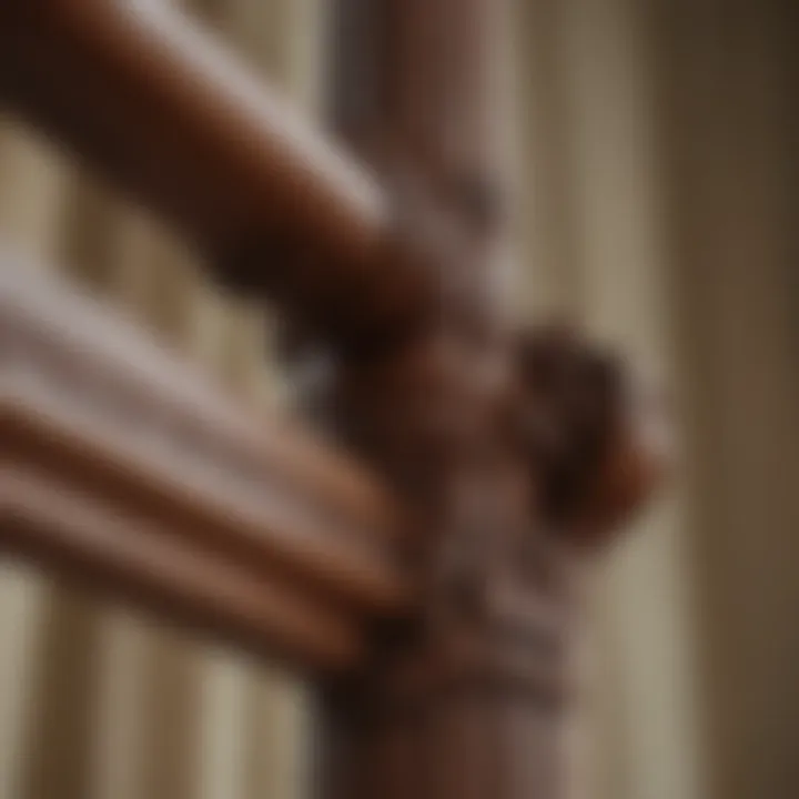 Close-up of intricate woodwork on a curtain rod holder
