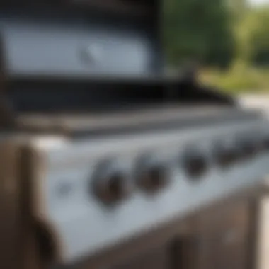 A close-up of various propane grill features and controls