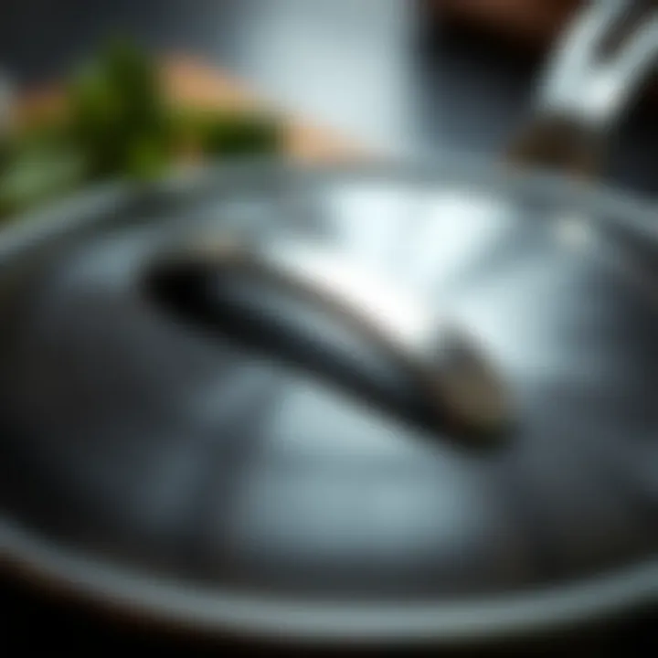 Close-up view of a stainless steel skillet lid emphasizing quality craftsmanship