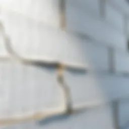 Detailed view of diagonal cracks in drywall highlighting structural issues